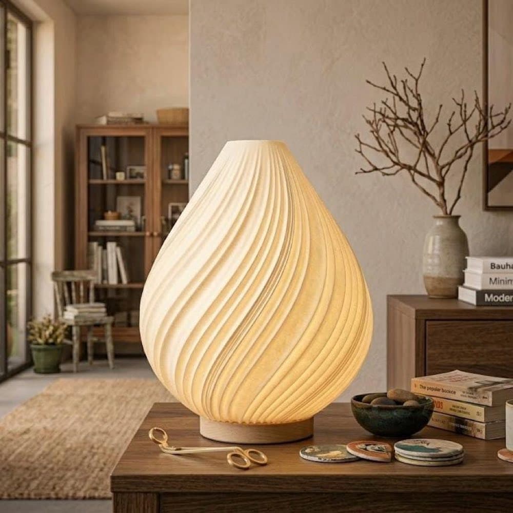 Modern spiral table lamp with a twisted sculptural shade